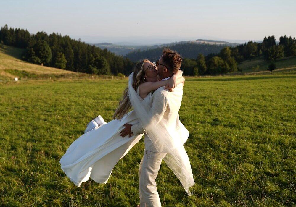 Olga and Maciej dancing in an alpine meadow in Switzerland – filmmakers behind Switzerland Wedding Film