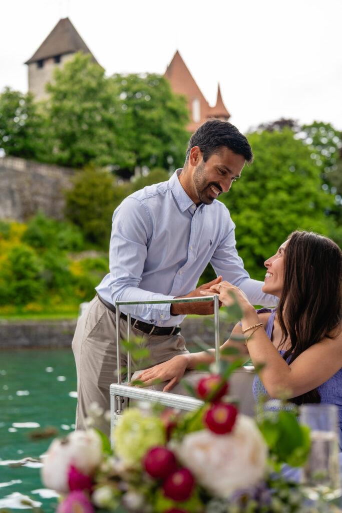 Romantic boat proposal gesture at Lake Thun castle