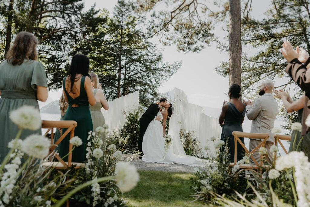 Bride and groom during outdoor wedding ceremony in the Swiss Alps